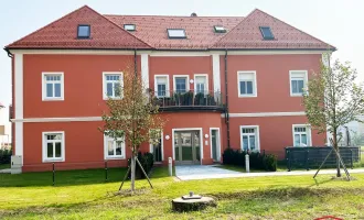 ANLEGEROBJEKT - Zentral begehbare 2-Zimmerwohnung mit Balkon und Carport in der Thermenregion (unbefristet vermietet)