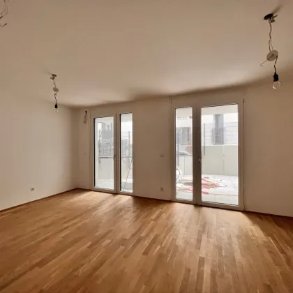 Neuer Preis!!! Erstbezug mit Terrasse! Moderne, toll aufgeteilte 2 Zimmer Wohnung im EG für nur 299.000€! Top 1 /B - Bild 2