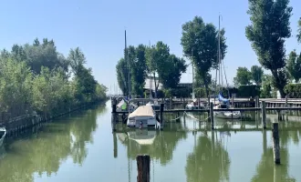 Traumhaftes Baugrundstück mit direktem Seezugang in Neusiedl am See im Refugium