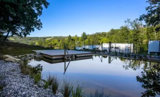 Garden Villas - Moderne Doppelhaushälfte in beliebter Lage mit idyllischem Naturteich