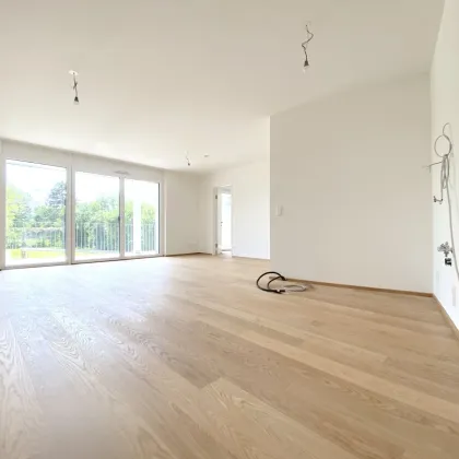 TRAUMHAFTE 4-ZIMMER-WOHNUNG MIT BALKON UND EINEM EIGENEN GARTEN - RUHIG GELEGEN - Bild 2