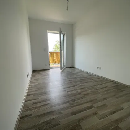 Einmalig - ersten 2 Mieten gratis -  65m² mit Balkon, Stellplätzen und top Ausstattung für nur 906,50 € Miete! - Bild 3