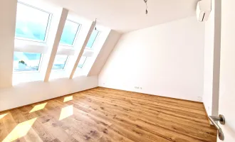 Exklusive helle Dachgeschosswohnung mit Dachterrasse und Weitblick! *Erstbezug*