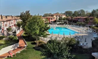 Schöne Ferienwohnung in Caorle, Veneto - Appartement mit Pool und Standnähe