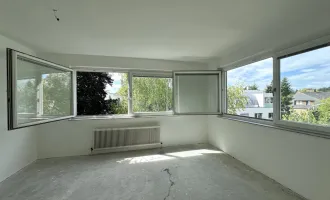 Helle Familienwohnung mit großzügiger Freifläche am Dach und Garagenplatz!