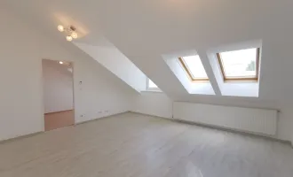 3 Zimmer DG-Wohnung mit Balkon!