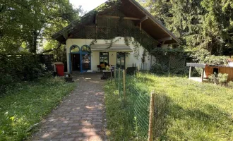 Gartenparadies mit idyllischem, finnischem Holzhaus wird zum Kauf angeboten - Perfekt für Familien und Ruhesuchende!