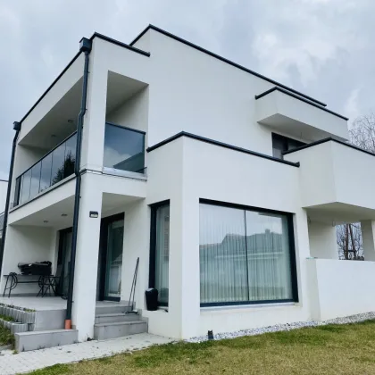 Exklusiv Wohnen auf Zwei Ebenen: Moderne Doppelhaushälfte mit Dachterrasse - Bild 2