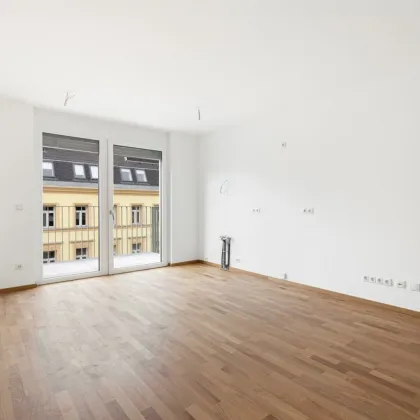 PROVISIONSFREI | Erstbezug |  2-Zimmer Neubau mit Balkon | Fernwärme | TG-Stellplatz optional | Nachhaltiges Wohnbauprojekt - Bild 2