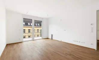 PROVISIONSFREI | Erstbezug |  2-Zimmer Neubau mit ca. 7 m² Balkon | Fernwärme | TG-Stellplatz optional | Nachhaltiges Wohnbauprojekt