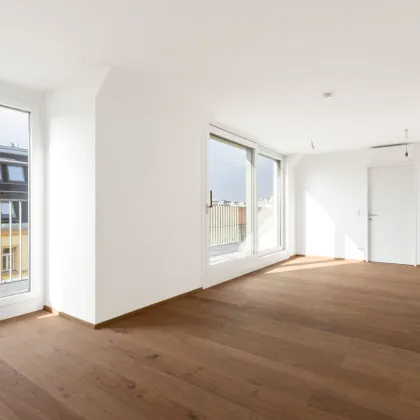 DACHGESCHOSS-ERSTBEZUG mit ca. 10 m² TERRASSE | Fernwärme | TG-Stellplatz optional | Nachhaltiges Wohnbauprojekt - Bild 2