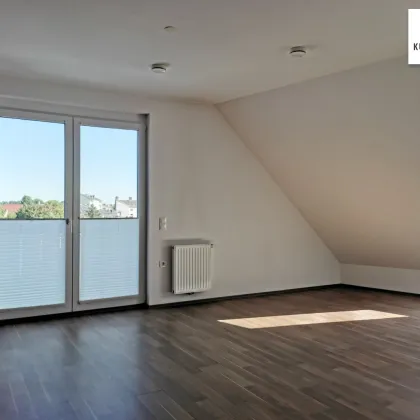 ruhige Dachgeschoßwohnung mit Freifläche und Fernblick - Bild 2