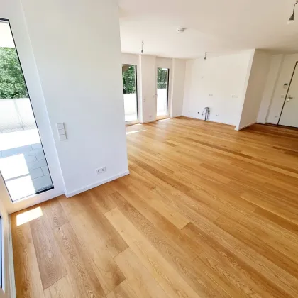 STOP - Schauen Sie sich das an! Geniale Neubauwohnung mit WOW-Effekt! Riesiger Balkon und Terrasse + Privater Dachgarten + Grün wohin das Auge reicht + Luftwärmepumpe! - Bild 3