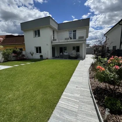 Exklusives Wohnvergnügen - Modernes Einfamilienhaus mit gepflegtem Garten und luxuriöser Ausstattung - Bild 3