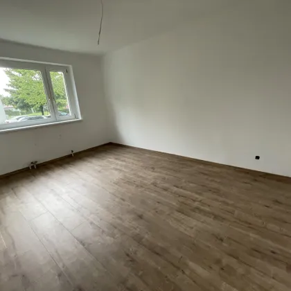 Erdgeschosswohnung mit Balkon! - Bild 2