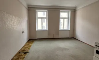 Sanierungsbedürftige 1-Zimmer-Altbauwohnung