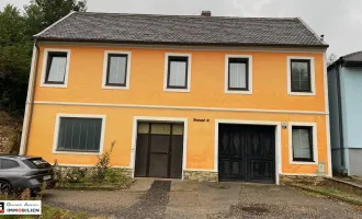 Vielseitiges Zweifamilienhaus in idyllischer Lage - perfekt für individuelle Gestaltung