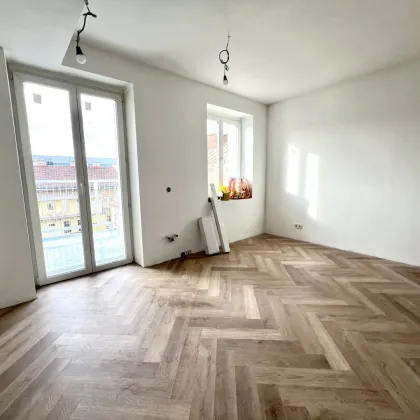 Urbaner Erstbezug mit Sonnenterrasse - 85m² pure Wohnqualität und den Sternen zum greifen nah! - Bild 3