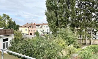 Bestlage nahe S-Bahn und Freizeitzentrum! Großzügiges Stadthaus im Zentrum mit zwei Balkonen, Garage und Garten