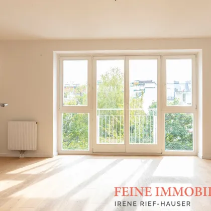 Entzückende Balkonwohnung mit Grünblick | Gemeinschaftsgarten - Bild 2