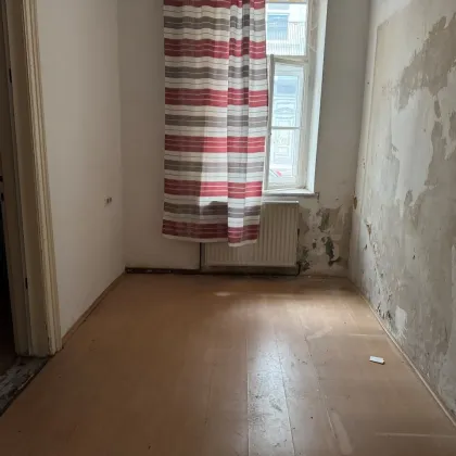 Sanierungsbedürftige 39m² Wohnung im Erdgeschoß - 1120 Wien - Bild 3