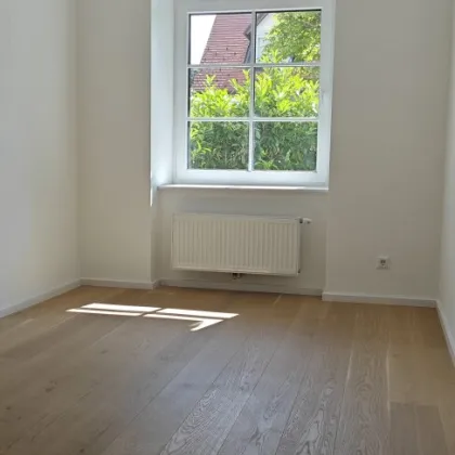 helle 2-Zimmer Erdgeschoß-Wohnung mit Terrasse - Bild 3