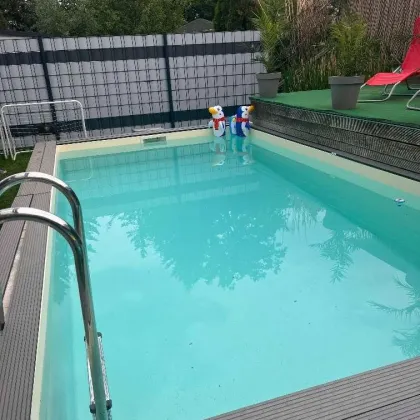 Haus mit Pool, Doppelcarport und Erdwärmeheizung - Bild 3