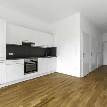 Zentrale moderne 1-Zimmer-Wohnung mit Terrasse und TG-Stellplatz in Kalsdorf bei Graz! - Bild 2