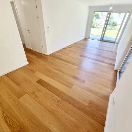 Das perfekte Familienparadies! Geniale Neubauwohnung mit WOW-Effekt! Riesiger Eigengarten und Terrasse + 4 Zimmer + Grün wohin das Auge reicht + Luftwärmepumpe! - Bild 3