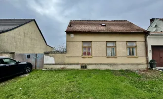 BAUGRUNDSTÜCK MIT EINEM SANIERUNGSBEDÜRFTIGEN HAUS IN LASSEE